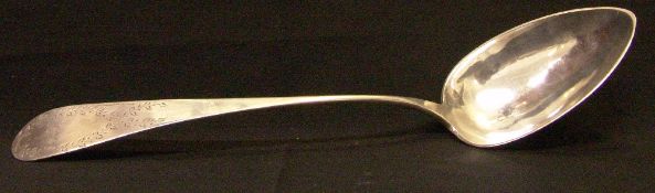 A 19th century silver serving spoon, marks indistinct, possibly Continental
The handle with bright