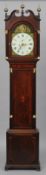 A George III oak carved and mahogany banded gilt metal mounted eight day bell striking longcase