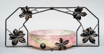 A Muller Freres glass and wrought iron centrepiece
The bi-coloured bowl mounted on a floral and