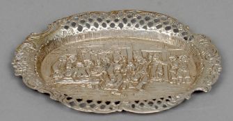 A Continental white metal pin tray
The centre embossed with figures making merry outside a tavern