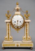 A 19th century gilt metal mounted alabaster mantel clock
The white enamelled dial with Roman