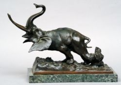 SYLVAIN NORGA (1892-1968) Belgian
A Snared Elephant
Patinated bronze, standing on naturalistic rocky