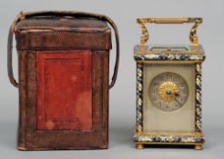 A 19th century French cloisonne decorated brass cased repeating carriage clock
The florally