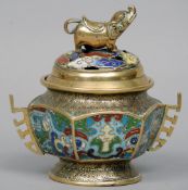 A 19th century Oriental cloisonne decorated bronze koro
The removable pierced domed lid surmounted