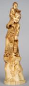 A Japanese carved ivory okimono
Formed as an elderly gentleman holding a bucket of flowers with a