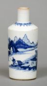 A small 19th century Chinese blue and white bottle vase
The main body decorated with a figure on a