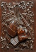 A pair of 19th century Continental carved oak tobacco shop panels
Each carved with various smoking