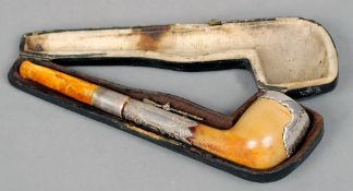 A Victorian white metal mounted meerschaum presentation pipe
Mounted with a rifle and inscribed