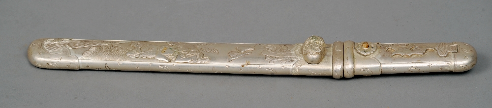 A Chinese white metal mounted tanto
The short blade housed in a cast scabbard with erotic