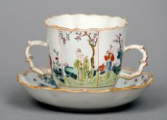 An 18th century Chinese painted porcelain cup and saucer
The twin handled cup decorated with various