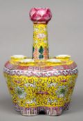 A 19th century Chinese porcelain famille jaune crocus vase
Of typical lobed form, decorated with