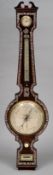 A 19th century rosewood banjo barometer
The shaped case with floral mother-of-pearl inlays,