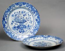 A matched pair of 18th century Chinese blue and white porcelain plates
Each decorated with a vase