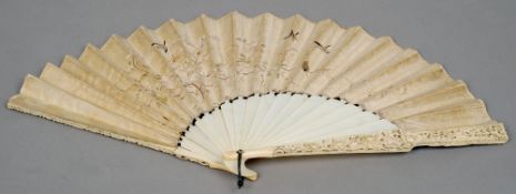 A large 19th century Cantonese carved ivory and silk work fan
The guards intricately carved with