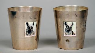 A pair of Sterling silver enamel decorated beakers
Each of tapering cylindrical form with an inset