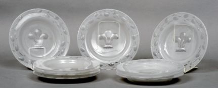 A set of ten etched frosted glass dishes
Each decorated with a band of floral decoration and centred