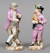 A 19th century Meissen porcelain figure
Modelled as a pink suited gentleman holding a cockerel;