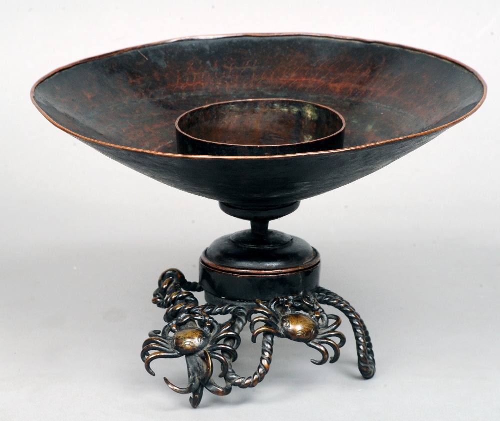 A Japanese patinated bronze and copper bowl on stand
The dished top section with a central ring,