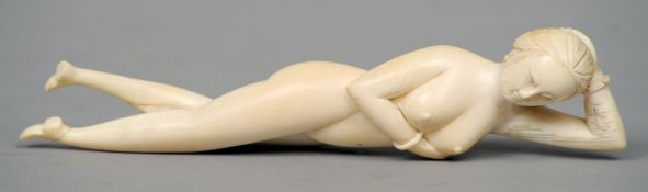 A 19th/20th century Chinese carved ivory medical figure
The naked female in typical pose.  19 cms