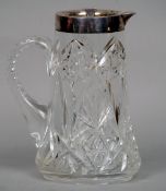 A George V silver mounted cut glass lemonade jug, hallmarked Birmingham 1926, maker's mark of JG & S