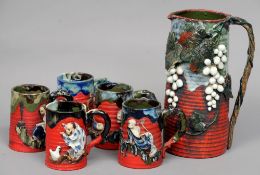 Seven pieces of Japanese Sumeda ware pottery
Comprising: wine jug, five tankards and a vase, all