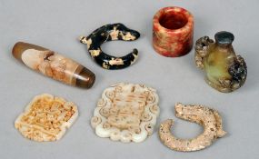 A small collection of various Chinese jade and hardstone items
Including: an archers ring, pendants,