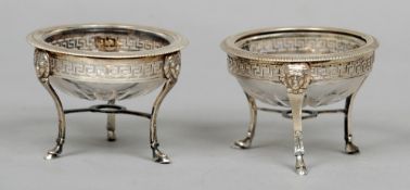 A pair of Continental unmarked white metal mounted glass salts
Each bowl supported on a pierced