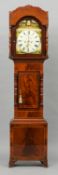 An early 19th century mahogany eight day longcase clock
The painted dial with Roman and Arabic