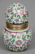 A Victorian unmarked silver gilt and enamel scent bottle
Of double gourd shape, decorated with