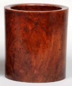 A 19th century Chinese carved hardwood brush pot
Of cylindrical section.  17 cms high.   CONDITION