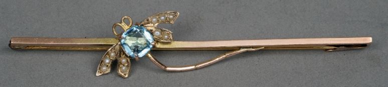 An Edwardian 9 ct gold bar brooch
Centrally set with a dragonfly.  7.5 cms wide.   CONDITION