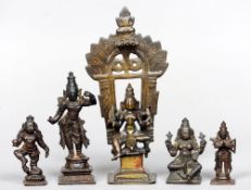Five early Indian bronze deities
Of various sizes and variously modelled.  The tallest 12 cms high.