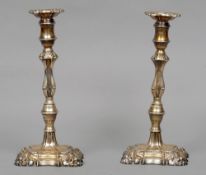 A pair of 18th century style silver candlesticks, hallmarked London 1966, maker's mark of A.T. & Son
