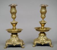A pair of 18th/19th century Nuremberg type bronze candlesticks
Each vine moulded sconce above a