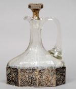 A 19th century Continental silver mounted etched glass decanter
The main body with scrolling