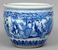 A 19th century Chinese blue and white porcelain fish bowl
Painted with dignitaries in a continuous