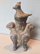 A Chinese archaistic bronze censor
The body formed as a pair of goats, the cover formed as a