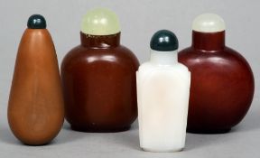 Four 19th century Chinese Peking glass snuff bottles
The tallest 7.5 cms high.  (4)   CONDITION
