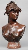 K.R. COLUMBO
An Art Nouveau bust, Boheme Orientale
Patinated bronze with inset glass cabochons to