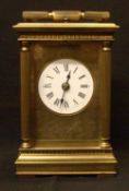 A brass cased repeating carriage clock by Charles Frodsham, London
The white enamelled dial with