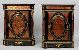 A pair of 19th century boulle side cabinets
Each ebonised cabinet with ormolu mounts and a boulle