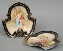 A pair of 19th century Vienna wall plates
Each of scalloped trilobed form, the gilt decorated cobalt