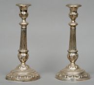 A pair of 18th century Italian silver candlesticks, marks indistinct
Each anthemion decorated drip-