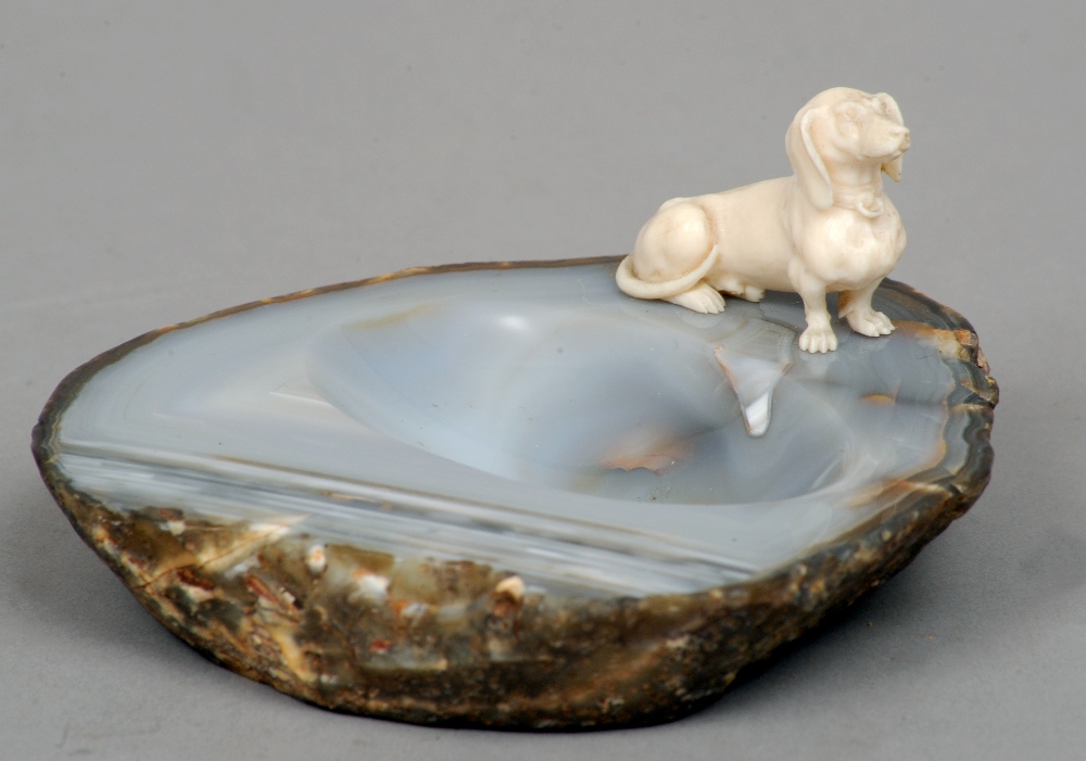 A small carved ivory model of a Dachshund
Naturalistically modelled and applied to an agate