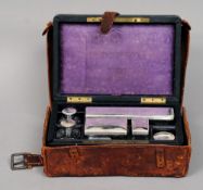 A 19th century Continental silver mounted vanity set
The glass fittings each with engraved and