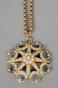 A Victorian 15 ct  gold seed pearl pendant brooch
Of domed star form, mounted on a 9 ct gold chain.