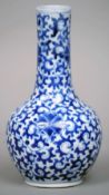 A 19th century Chinese porcelain blue and white vase
Of bottle form, decorated in underglaze blue