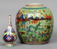 An 18th century Chinese porcelain water dropper
Of slender baluster form and polychrome decorated;