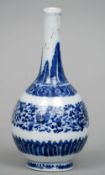 A 19th century Chinese blue and white bottle vase
The elongated neck above the bulbous body with