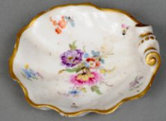A Meissen porcelain pin tray
Modelled as a scallop shell, decorated with floral sprays, blue painted